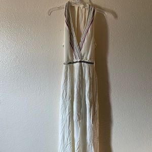 Long backless cream/white colored dress with deep plunge